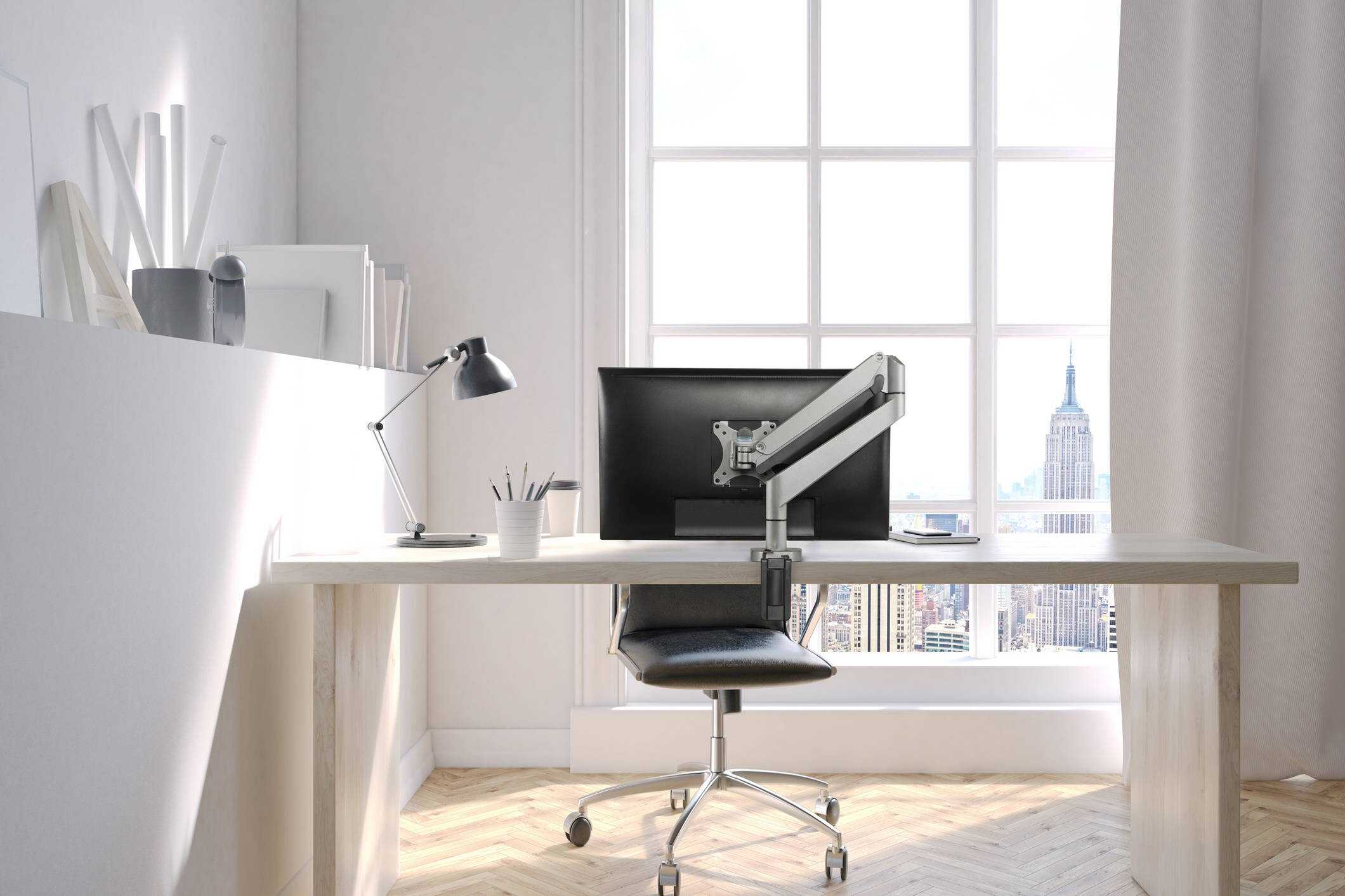 Study room interior ENVOY 1 lifestyle wood desk <ul> <li>Screen size: Up to 32"</li> <li>Mount supports monitors 2.2 - 19.8 lbs.</li> <li>Color: Silver</li> <li>Height Adjustment: 13.2 | Extension Range 23.7"</li> <li>Pivot: Landscape / Portrait</li> <li>Rotation: 270° at base, 360° at mid joint, 180° at upper joint</li> <li>VESA Compatibility: 75 & 100mm, quick-release adapter included</li> <li>Warranty 10 years</li> </ul>